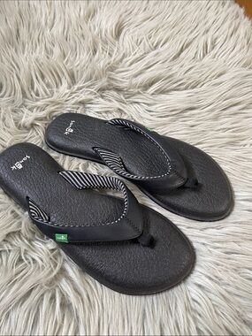 Sanuk Black Flip Flops with Striped Strap Accents